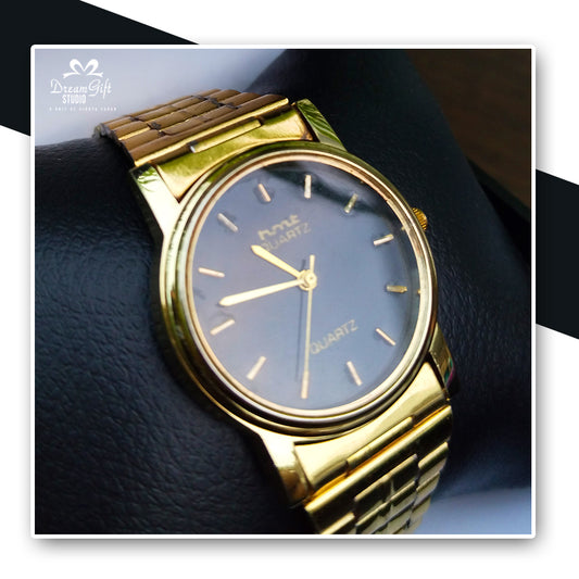 HMT Classic elegance watch with a gold-tone finish and minimalist dial