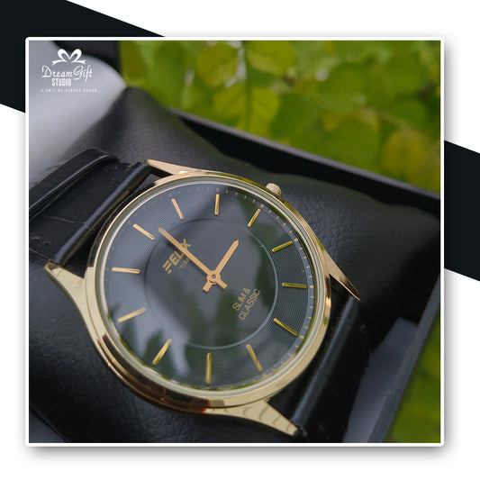 Felix Slim & Classic Watch with a golden bezel and black dial
