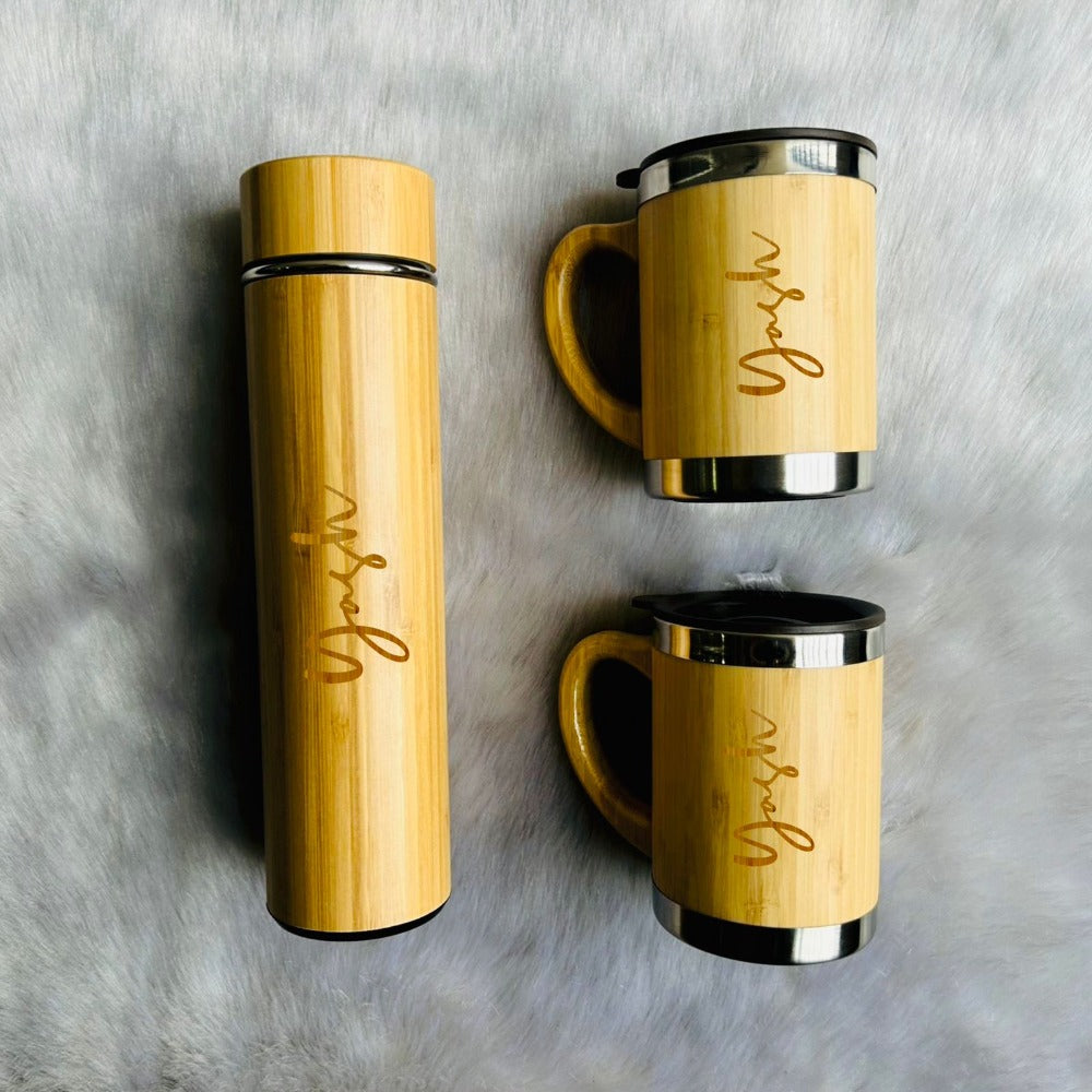 dynamic close up view of bottle and mugs 