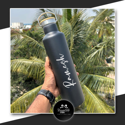 customised  bottle with name printed in silver color on a Black bottle 